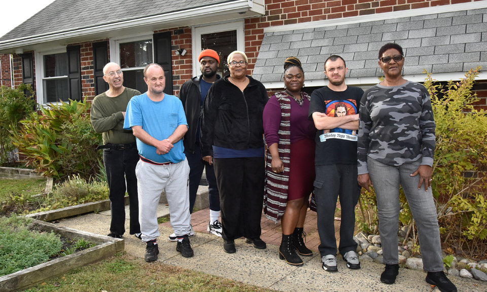Group home residents with support staff